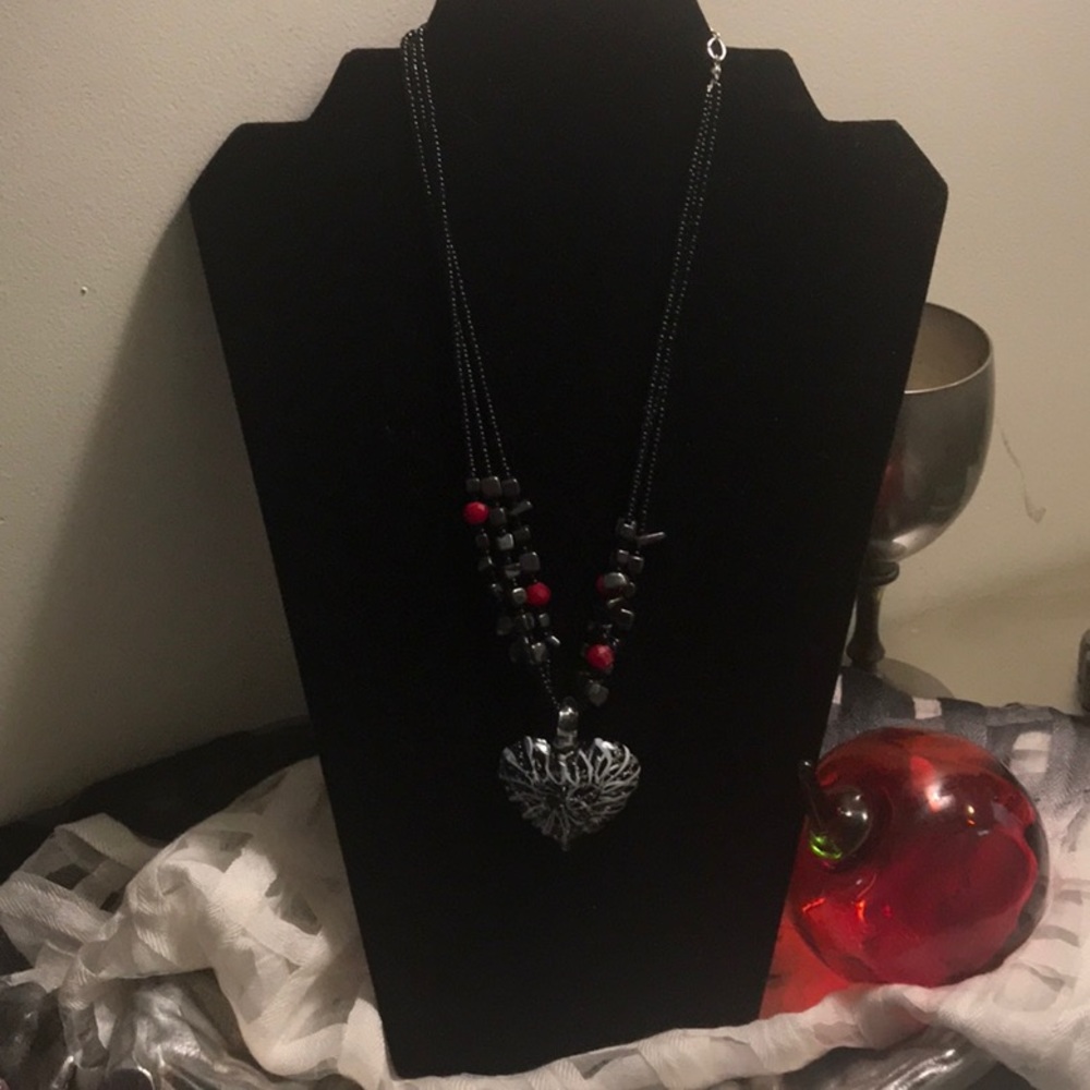 3 photos of this black, white ,and red glass heart - Picture 2 of 3